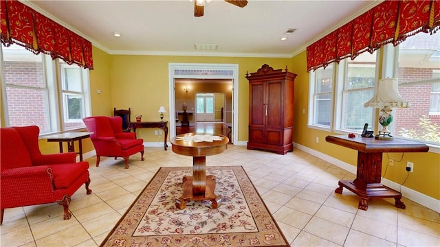 1457 N River Oaks Dr, Blackshear, GA 31516 - living area featuring plenty of natural light, ornamental molding, light tile patterned floors, and ceiling fan