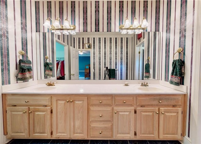 1457 N River Oaks Dr, Blackshear, GA 31516 - bathroom with a chandelier, wallpapered walls, and double vanity