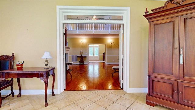 1457 N River Oaks Dr, Blackshear, GA 31516 - hallway featuring baseboards and light tile patterned floors