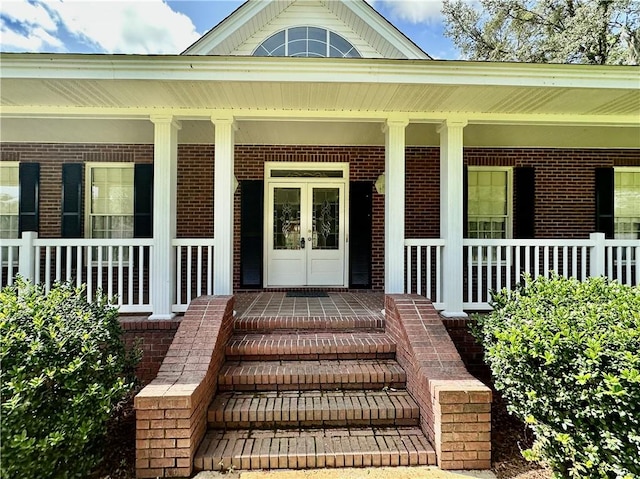 1457 N River Oaks Dr, Blackshear, GA 31516 - entrance to property featuring covered porch and brick siding