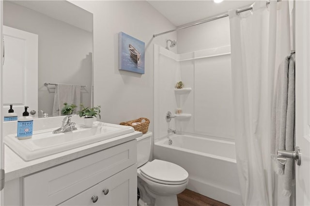 full bathroom with wood-type flooring, vanity, toilet, and shower / bathtub combination with curtain