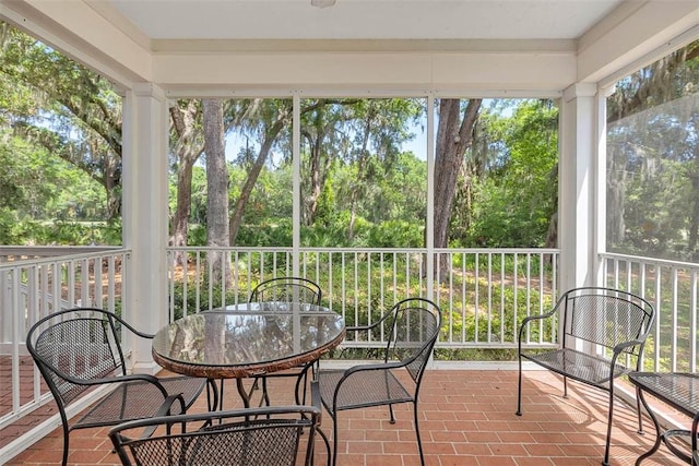 sunroom / solarium with a healthy amount of sunlight