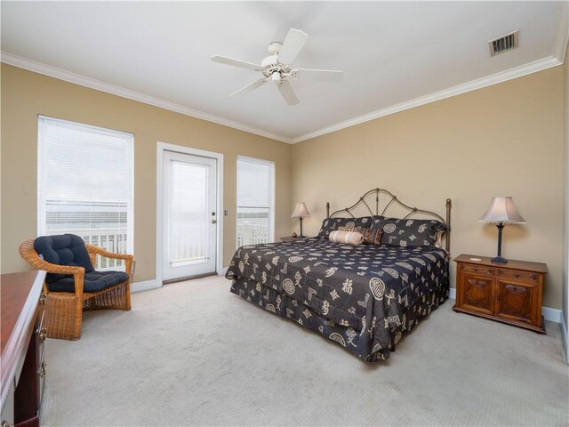 1106 Plantation Point Dr, Saint Simons Island, GA 31522 - bedroom with ornamental molding, carpet, access to exterior, baseboards, and ceiling fan