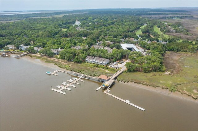 1106 Plantation Point Dr, Saint Simons Island, GA 31522 - drone / aerial view of a nearby body of water and a heavily wooded area