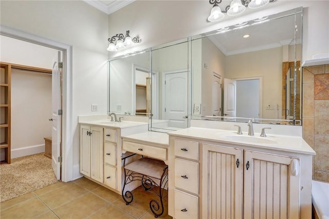 bathroom with ornamental molding, tile patterned flooring, and vanity