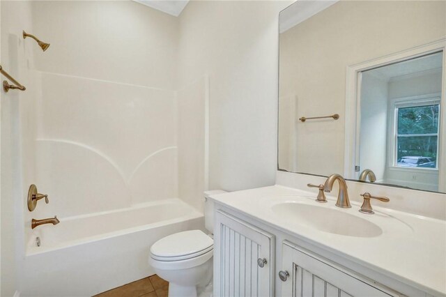 full bathroom with vanity, tile patterned floors, toilet, and shower / bath combination