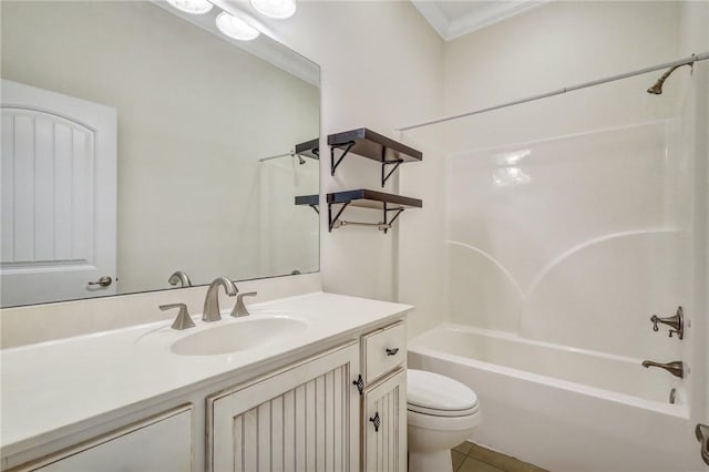 full bathroom with tile patterned floors, toilet, bathing tub / shower combination, crown molding, and vanity