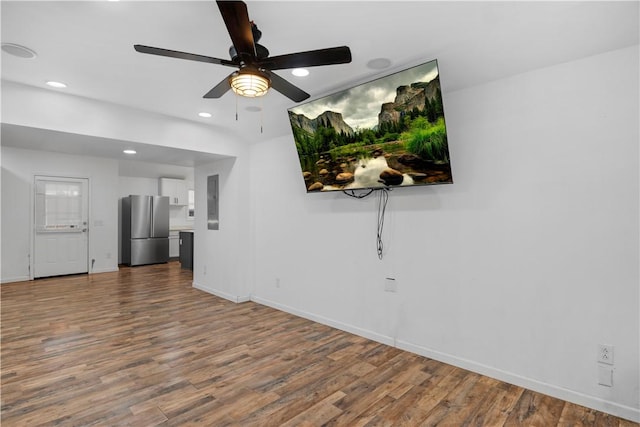544 Lud Oquinn Rd, Odum, GA 31555 - unfurnished living room with wood finished floors, baseboards, a ceiling fan, and recessed lighting