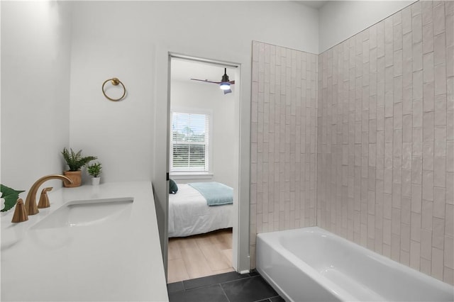 bathroom with sink and tile patterned flooring