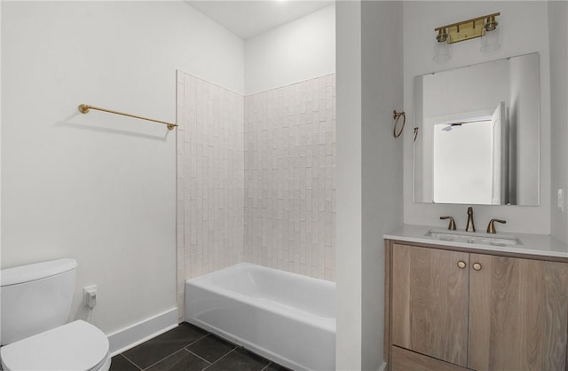 full bathroom featuring vanity, tile patterned floors, tiled shower / bath combo, and toilet