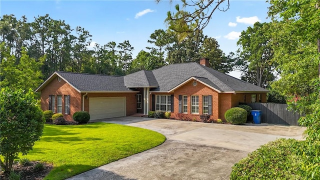 500 Altamaha Rd, Jesup, GA 31545 - ranch-style house featuring brick siding, concrete driveway, an attached garage, and a chimney