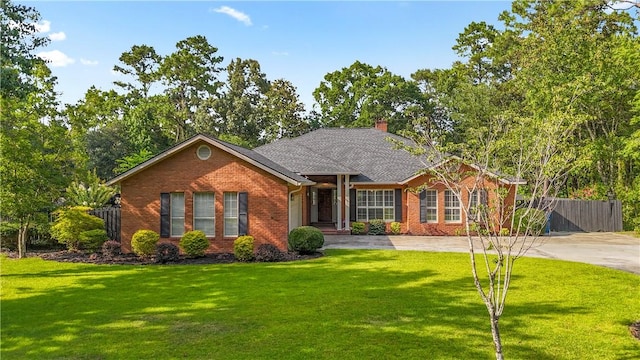 500 Altamaha Rd, Jesup, GA 31545 - view of front of property with brick siding, concrete driveway, and a chimney