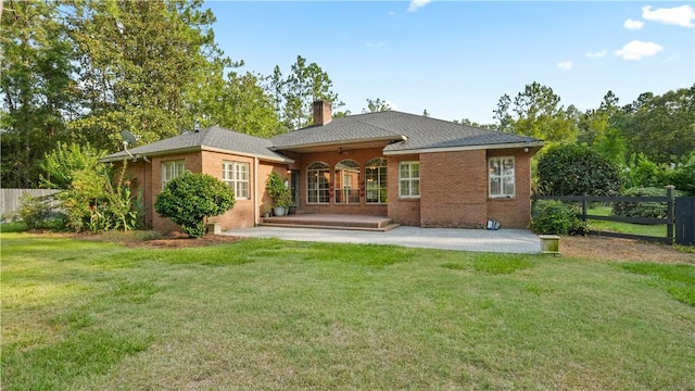 500 Altamaha Rd, Jesup, GA 31545 - back of house featuring french doors, a chimney, and brick siding