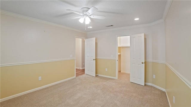 500 Altamaha Rd, Jesup, GA 31545 - unfurnished bedroom featuring light carpet, recessed lighting, crown molding, and a ceiling fan