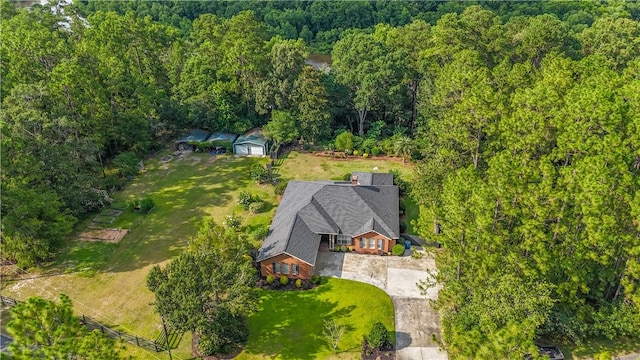 500 Altamaha Rd, Jesup, GA 31545 - aerial view of property and surrounding area featuring a heavily wooded area