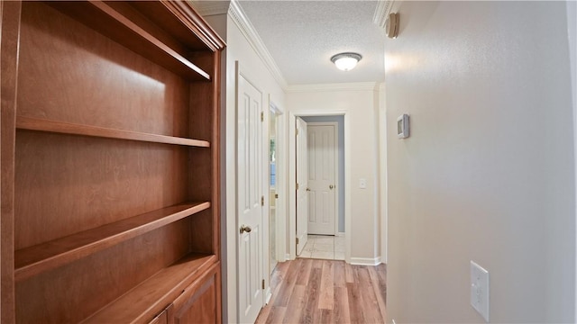 500 Altamaha Rd, Jesup, GA 31545 - hall featuring ornamental molding, a textured ceiling, and light wood-style floors