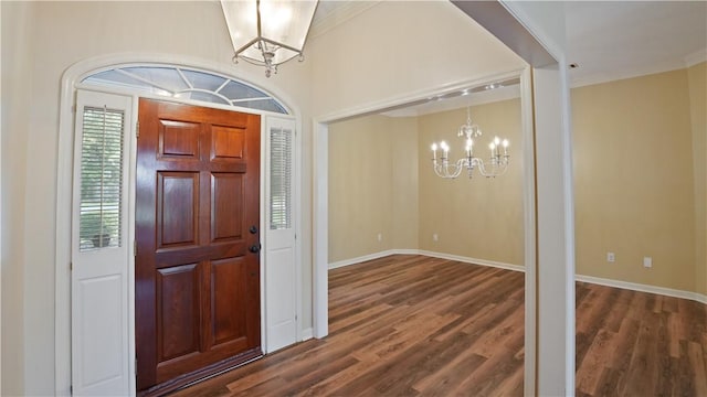 500 Altamaha Rd, Jesup, GA 31545 - foyer featuring a chandelier, dark wood-style floors, and crown molding