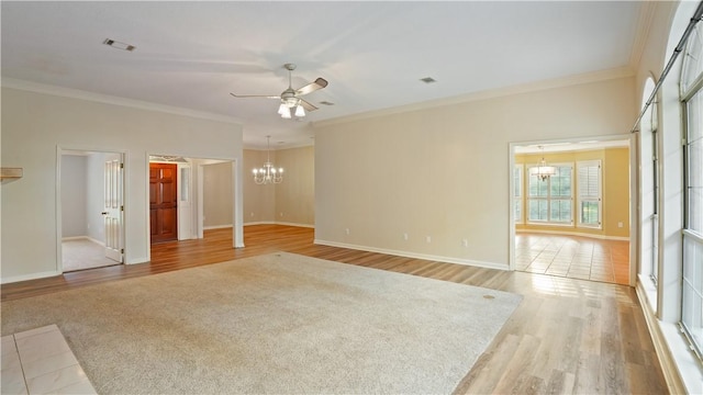 500 Altamaha Rd, Jesup, GA 31545 - spare room featuring a chandelier, ornamental molding, light wood finished floors, and a ceiling fan