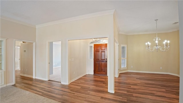 500 Altamaha Rd, Jesup, GA 31545 - spare room with ornamental molding, a chandelier, and wood finished floors