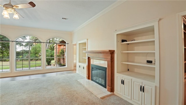 500 Altamaha Rd, Jesup, GA 31545 - unfurnished living room featuring light colored carpet, ornamental molding, ceiling fan, a fireplace, and built in features