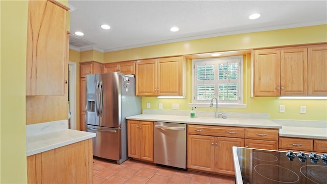 500 Altamaha Rd, Jesup, GA 31545 - kitchen with appliances with stainless steel finishes, crown molding, light tile patterned floors, light countertops, and recessed lighting