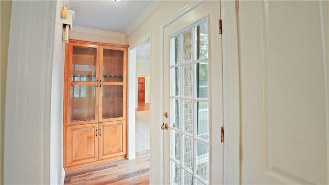 500 Altamaha Rd, Jesup, GA 31545 - doorway featuring healthy amount of natural light, ornamental molding, and light wood-type flooring