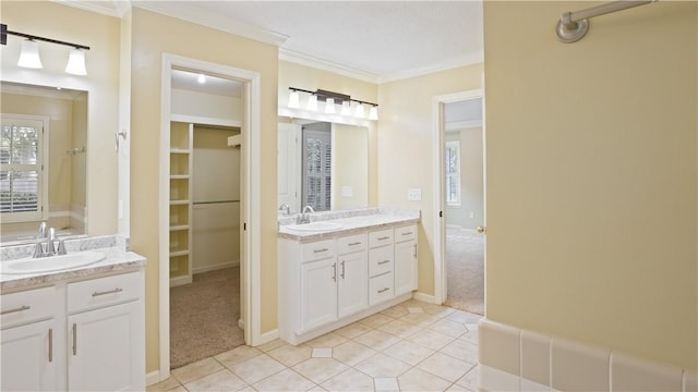 500 Altamaha Rd, Jesup, GA 31545 - full bathroom featuring crown molding, two vanities, tile patterned floors, and a walk in closet