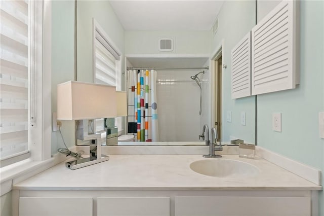 1332 Oak St Unit 9, Saint Simons Island, GA 31522 - full bath with vanity and a shower with shower curtain