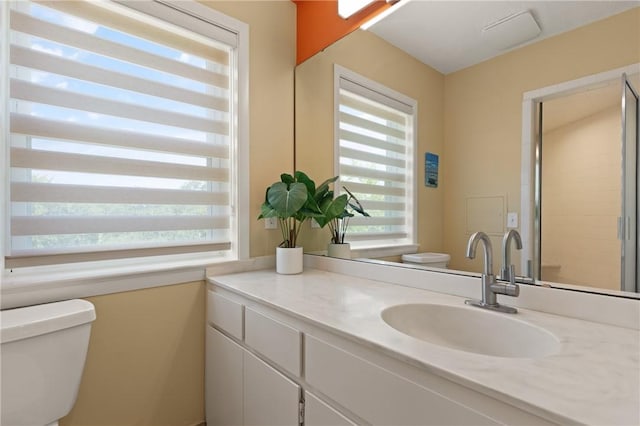 1332 Oak St Unit 9, Saint Simons Island, GA 31522 - bathroom with toilet and vanity