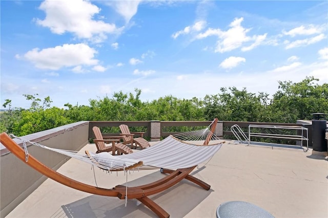 1332 Oak St Unit 9, Saint Simons Island, GA 31522 - view of patio / terrace with view of scattered trees