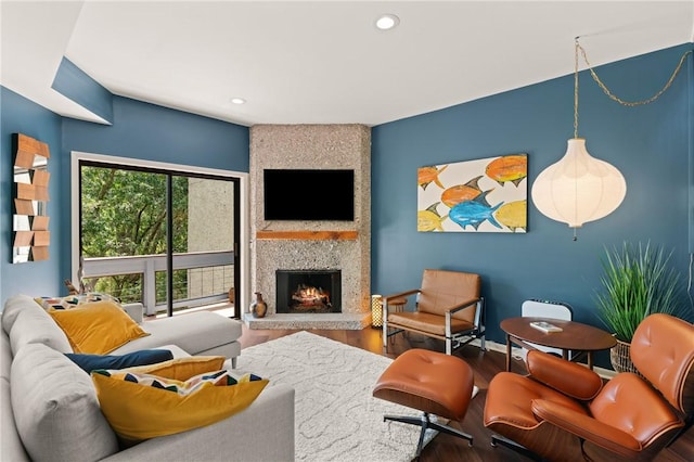1332 Oak St Unit 9, Saint Simons Island, GA 31522 - living area featuring a fireplace, wood finished floors, and recessed lighting