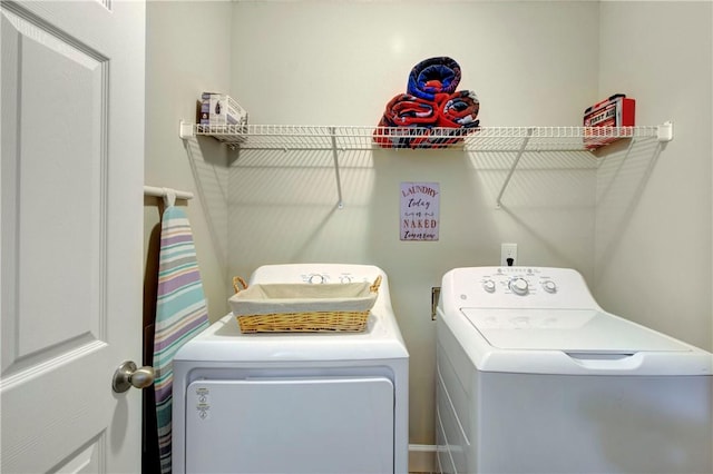 laundry area with washer and dryer and laundry area