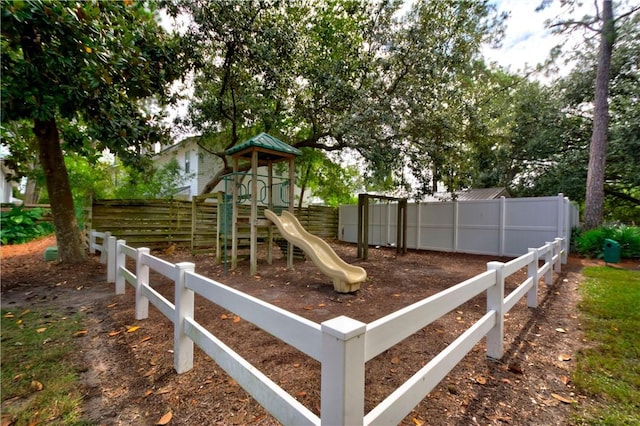 view of play area featuring fence