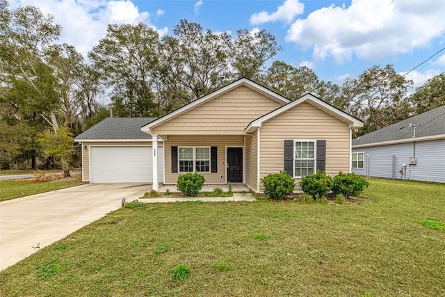 ranch-style home featuring a garage and a front yard