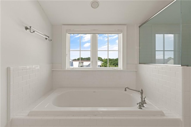 bathroom featuring a bath