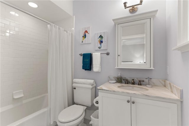 full bathroom featuring vanity, shower / bath combo, and toilet