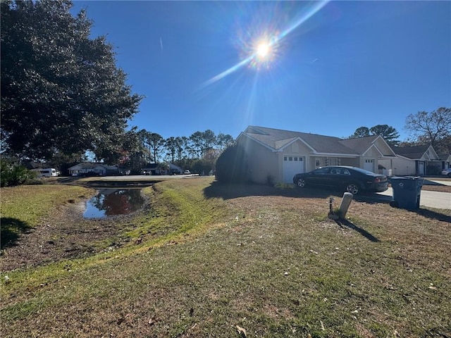 view of property exterior with an attached garage