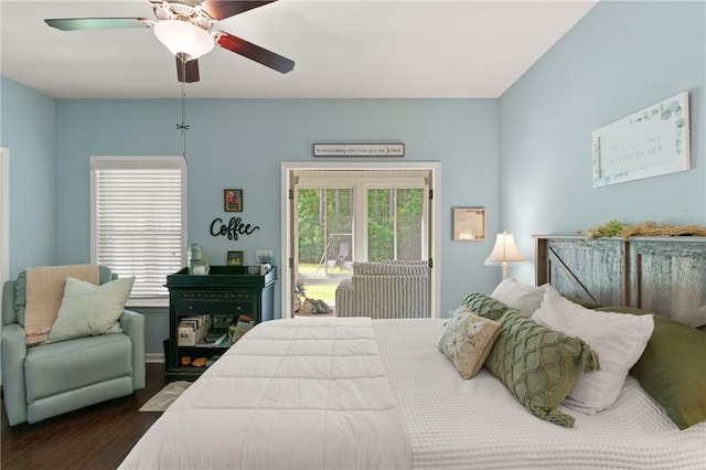 1067 Tidal Dr SE, Townsend, GA 31331 - bedroom featuring dark wood finished floors, access to exterior, and ceiling fan
