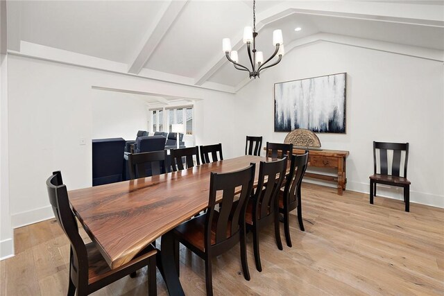 1626 Bruce Dr, Saint Simons Island, GA 31522 - dining area featuring vaulted ceiling with beams, baseboards, a chandelier, recessed lighting, and light wood-style flooring