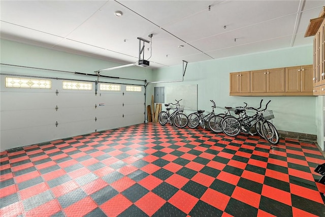 1626 Bruce Dr, Saint Simons Island, GA 31522 - garage featuring electric panel and a garage door opener