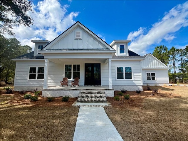 view of front of house with a porch and board and batten siding