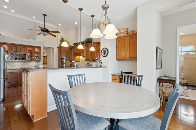 2491 Isles Of St Marys Way, Saint Marys, GA 31558 - dining room featuring dark wood-style floors, ceiling fan, and recessed lighting