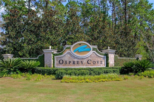 2491 Isles Of St Marys Way, Saint Marys, GA 31558 - community / neighborhood sign featuring a yard