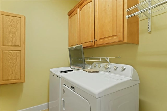 151 Raymonds Grant Trce, Saint Simons Island, GA 31522 - laundry area featuring washer and dryer and cabinet space