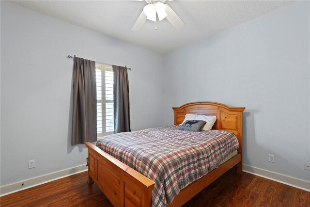 151 Raymonds Grant Trce, Saint Simons Island, GA 31522 - bedroom with wood finished floors and ceiling fan