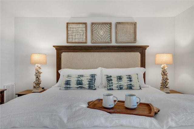 bedroom featuring visible vents