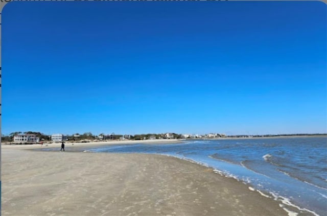 property view of water featuring a view of the beach