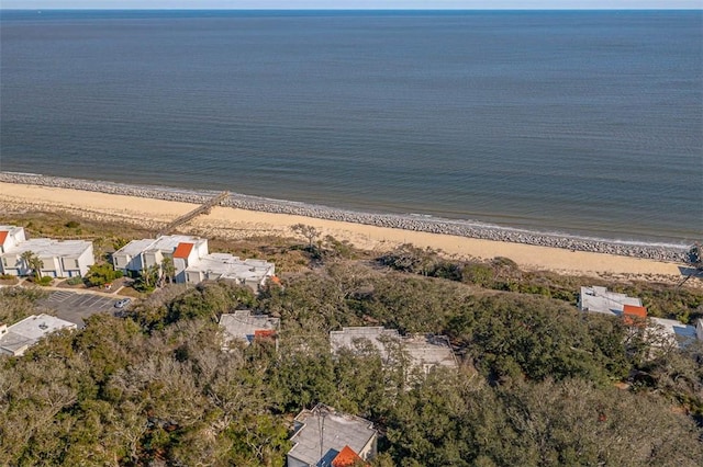 drone / aerial view with a beach view and a water view