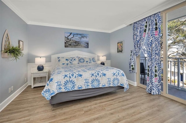 bedroom featuring access to exterior, light hardwood / wood-style floors, and crown molding