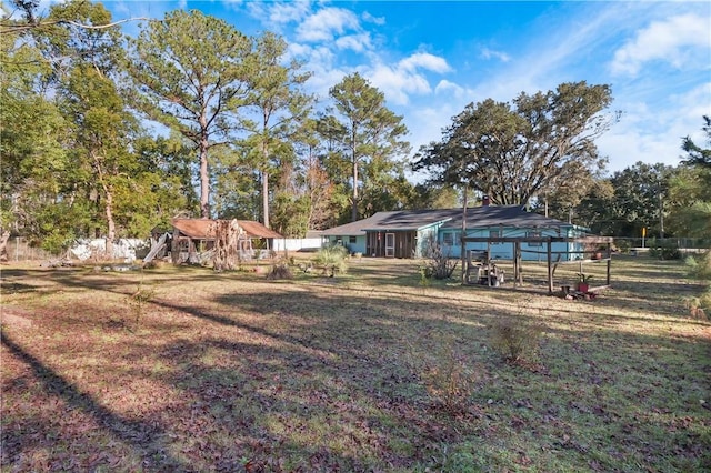 view of yard featuring fence